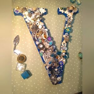 Decorative Blue Letter V with Embellishments